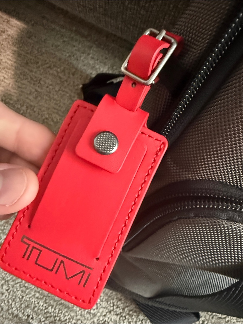 Tumi Gray Sling Bag with Red Accent- NEVER USED OR WORN. Tags removed, A gift - Picture 9 of 9